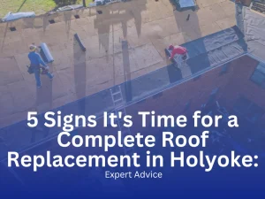 Roofers removing old shingles and installing underlayment during a full roof replacement in Holyoke, Massachusetts